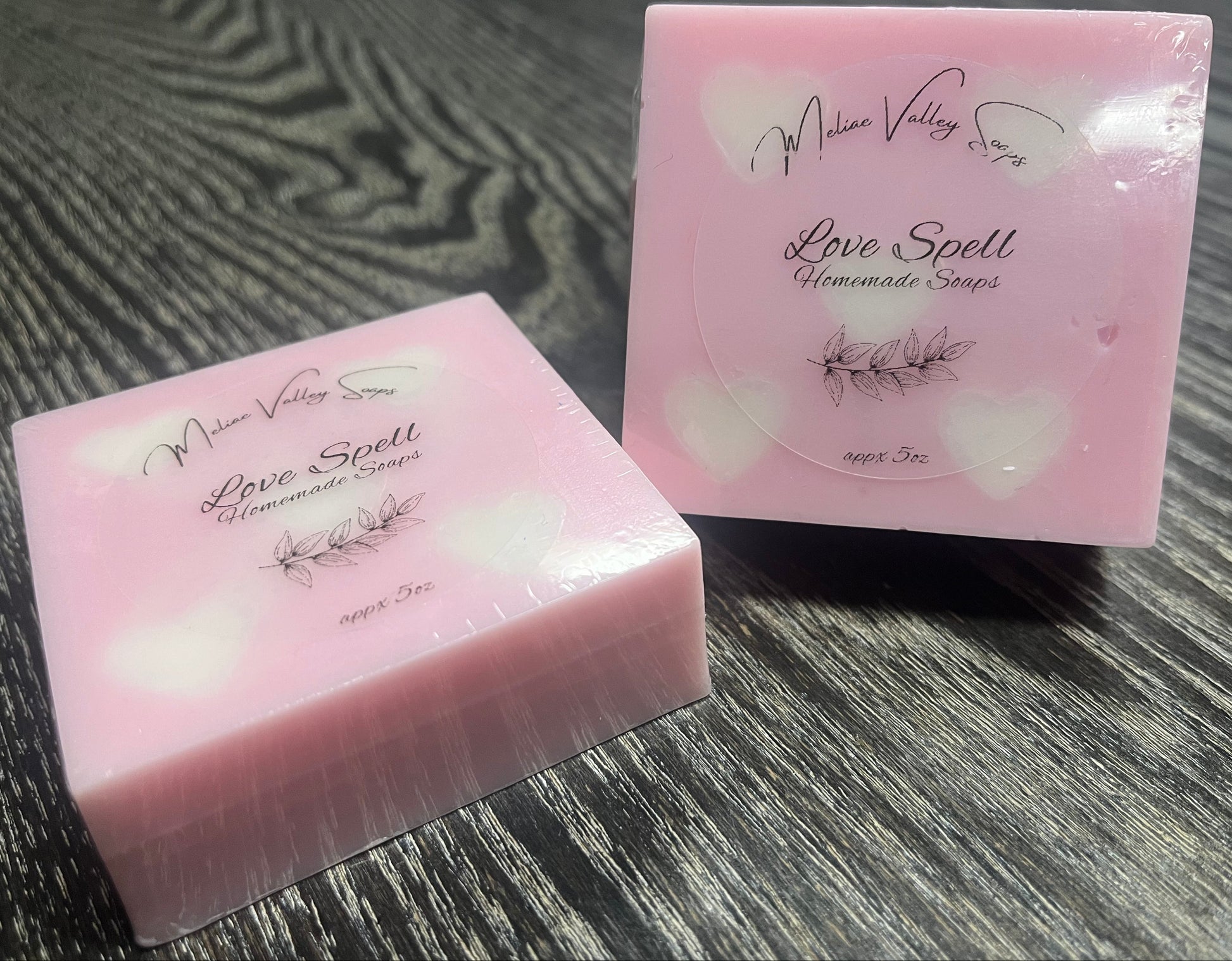 Pink soap bars with white heart embeds.