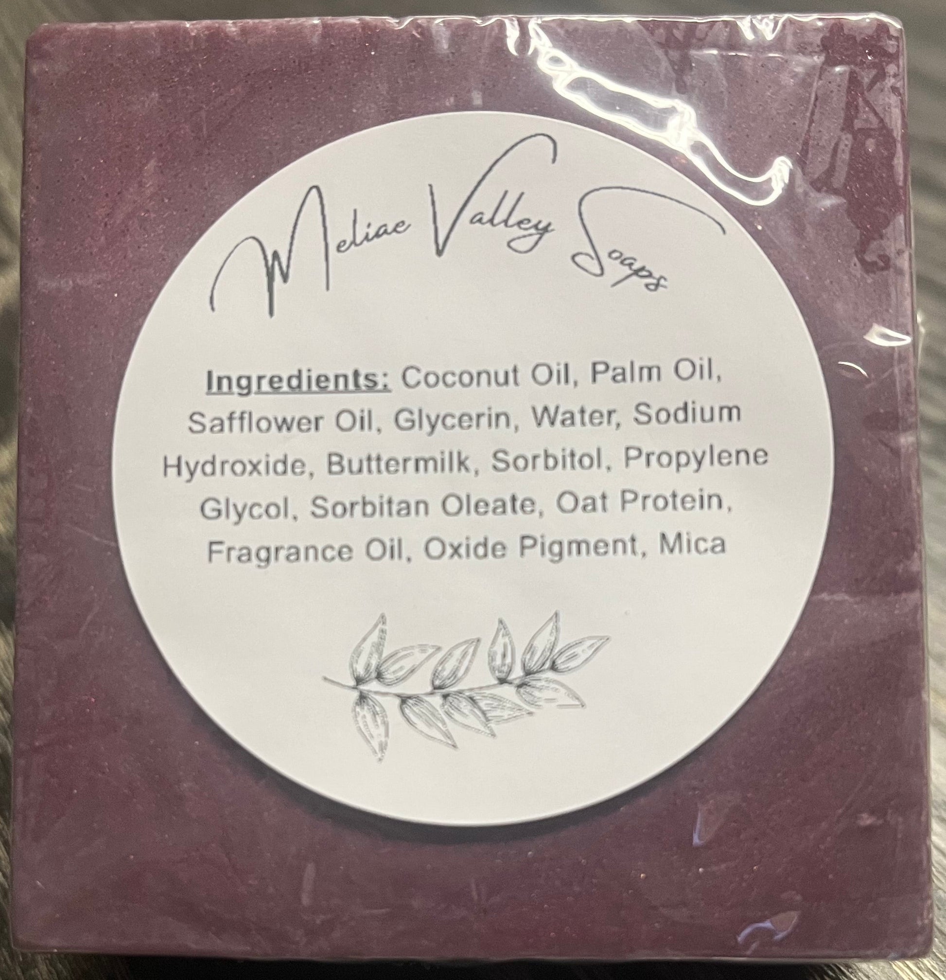 Purple soap bar with an ingredients label.