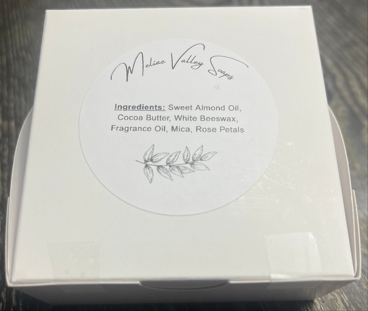 White product packaging with ingredients.