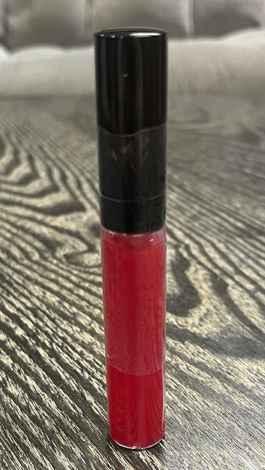 A red tube of lip gloss. 