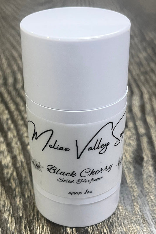A white tube with a label on the front. 