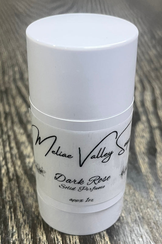 A white tube with a label on the front. 