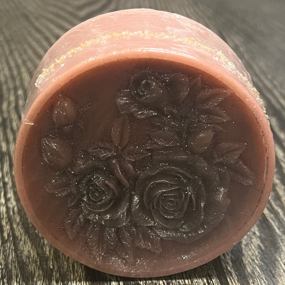 A dusty rose bar of soap. 